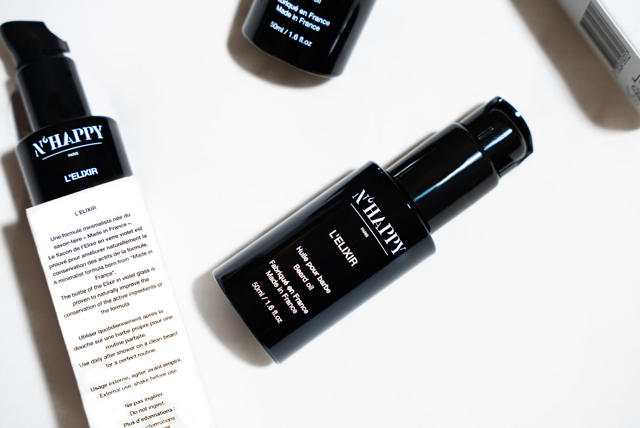 Packshot premium de l Élixir Nhappy présenté sur fond clair